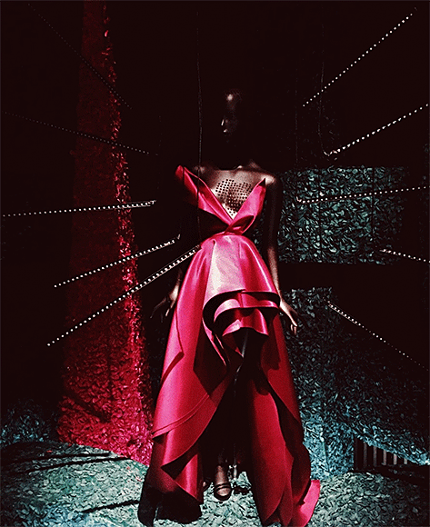 H&M "Love" dress, in the exhibition gallery of the same name. Photo by Mattias Lindbäck. Red gown with flashing heart and red lights