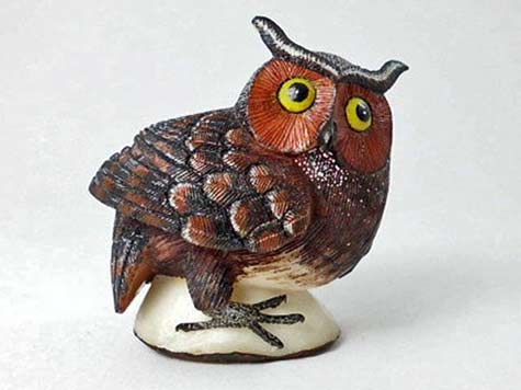 Hand carved owl sculpture