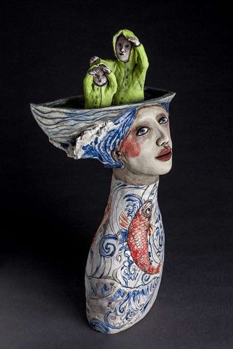 Amanda-Shelsher-female bust with an occupied row boat on her head