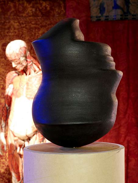 Artempo - where-time-becomes-art - inverted black head sculpture