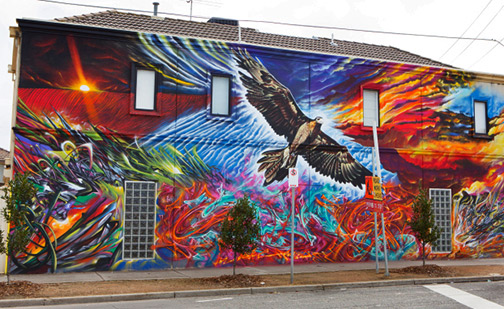 artist-Heesco-created-the-two-storey-tall-Albert-Street-mural-of-Bunjil-the-Creator