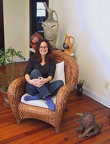 Carol Gentithes seated in chair photo portrait