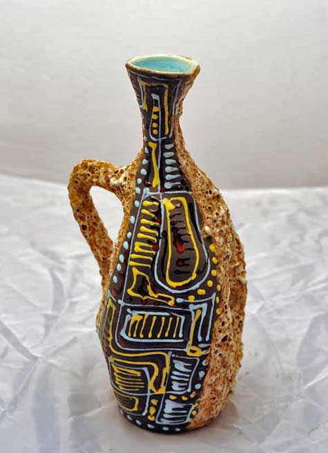 Ceramic-vase-with-special-effect-processing-lava-and-relief-decorations-in-bright-enamel-on-matt-base-Norri
