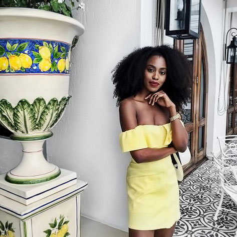 Model color coordinated with planter