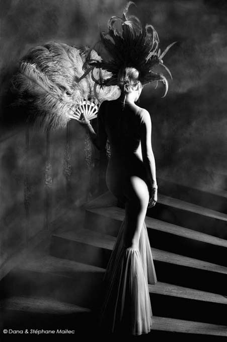 dana-and-stephane-maitec-fashion photography-model on stairs high contrast lighting