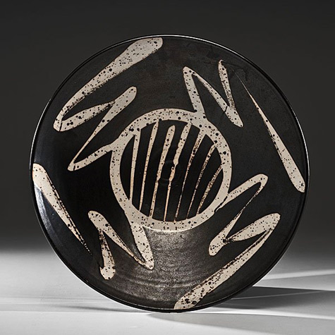 David-Nelson---Black-and-White-Charger - abstract motifs in white on a black plate