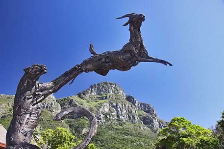 Derek Keats-photo-gazelle and lion-sculpture