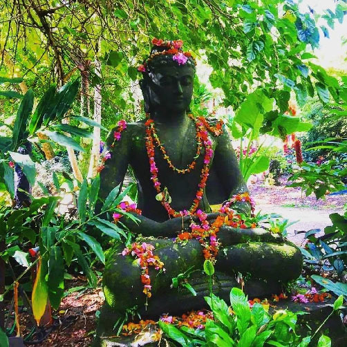 Buddha with garlands