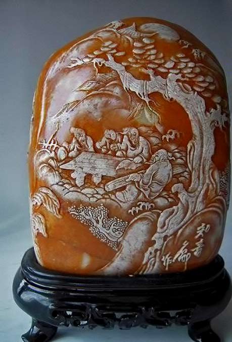 Dongcheng District, China carved stone scholars under tree