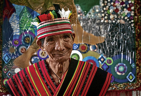 Village elder in the Philippines in colourful attire