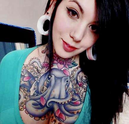 Harliequinnxlk octopus chest tattoo