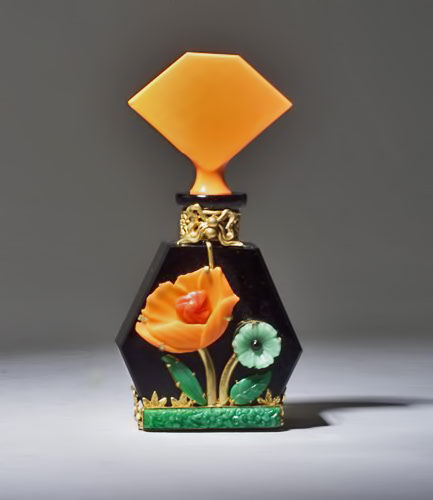 Heinrich Hoffman perfume bottle, circa-1920s,-in-opaque black and orange crystal with metalwork and jewels