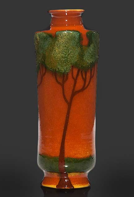 Humler-and-Nolan-Weller-Faience-vase,-Rhead-like-trees, in orange and green