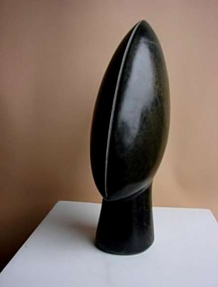 James-Mbanda-Split-Head - minimal head sculpture