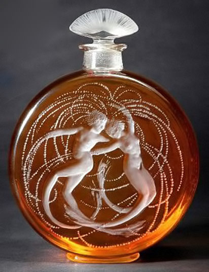 Rene-Lalique-perfume-bottle amber glass with whit dancing female nudes
