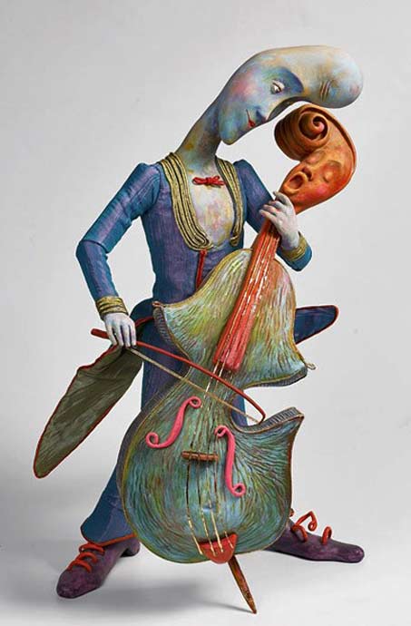 larisa-churkina figurine sculpture of a man playing a singing cello
