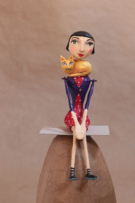 Mauricio Perez--girl sitting with cat