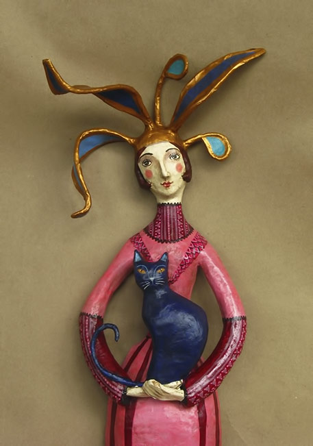 Mauricio Perez -- 2015-black-cat with lady in a pink dress