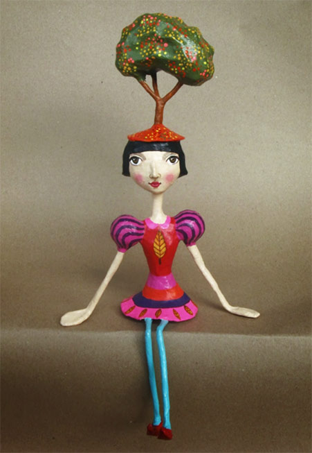 Mauricio-Perez-paper-mache-girl with tree hat