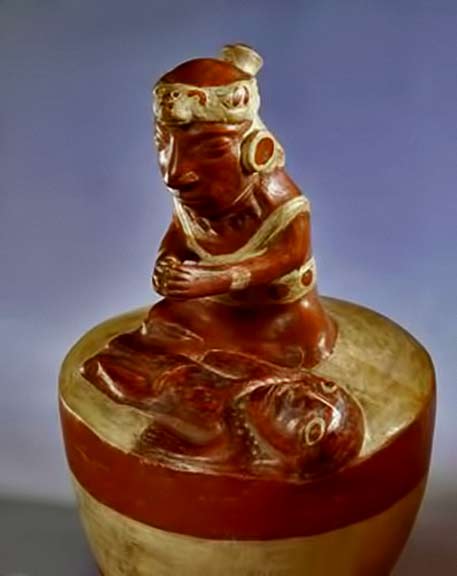 ceramic shaman figure praying