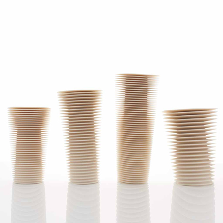 Nicholas-Lees-white grouping of ceramic-sculpture vessels