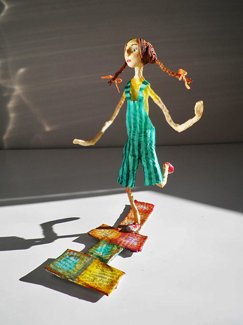 Natalia Mendoza girl in green dress hopscotch figure