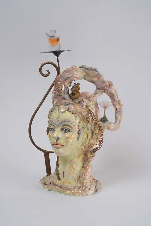 Once-Upon-a-Treble-Clef.Onceuponatrebleclef-afterFrida-2021-firedceramic-perfumebottlemetalbrush-17x9x9inches
