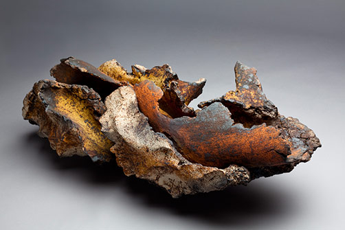 Pascale Lehman - ceramic sculpture of combined individual pieces with earthy tones