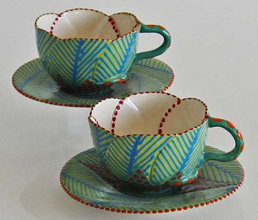 potterseed-leaf motif cups and saucers