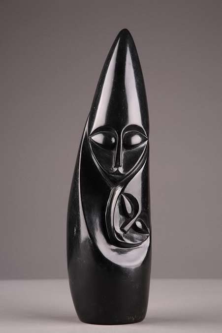 Serpentine-marble-sculpture-representing-a-mother-and-her-child