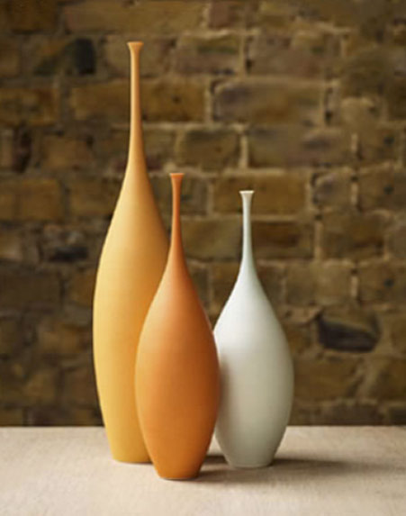 Orange and white ceramic bottles -- Sophie Cook