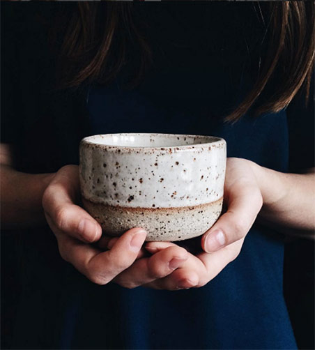 stoneware-tea-cup-with-a-shino-glaze -- Nicolette-Johnson