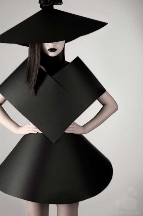suprematism-ii-by-olga-zavershinskaya - model wearing a black geometrical dress and hat