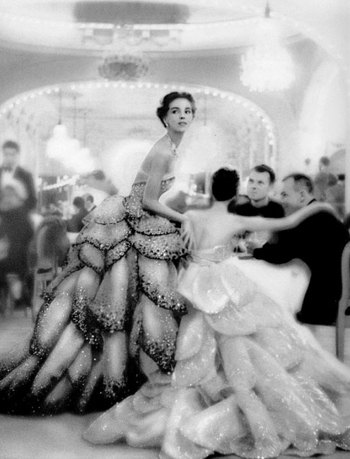 Theo-Graham-in-Dior-s-evening-gown-called--Junon---l--and-Dorian-Leigh-in-gown-called--Venus---photo-by-Richard-Avedon-at-Le-Pré-Catalan--Paris-August-1949