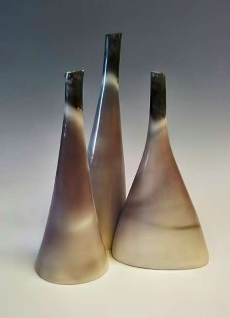 three-tall-saggarfired-vessels-by-christine-gittins-ceramic-sculpture