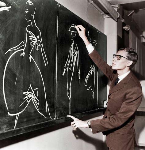 We-must-never-confuse-elegance-with-snobbery - Yves Saint Laurent sketching designs on a blackboard